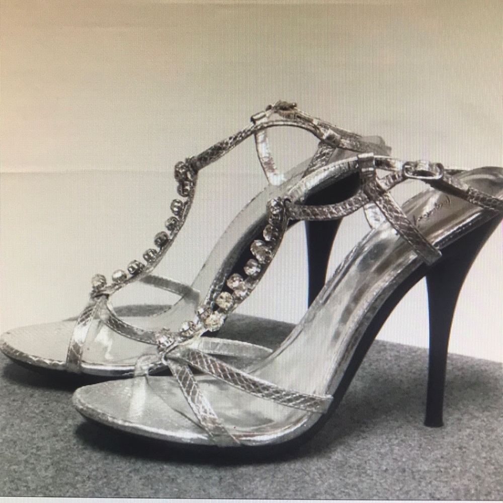 silver with rhinestones heels only worn once !
